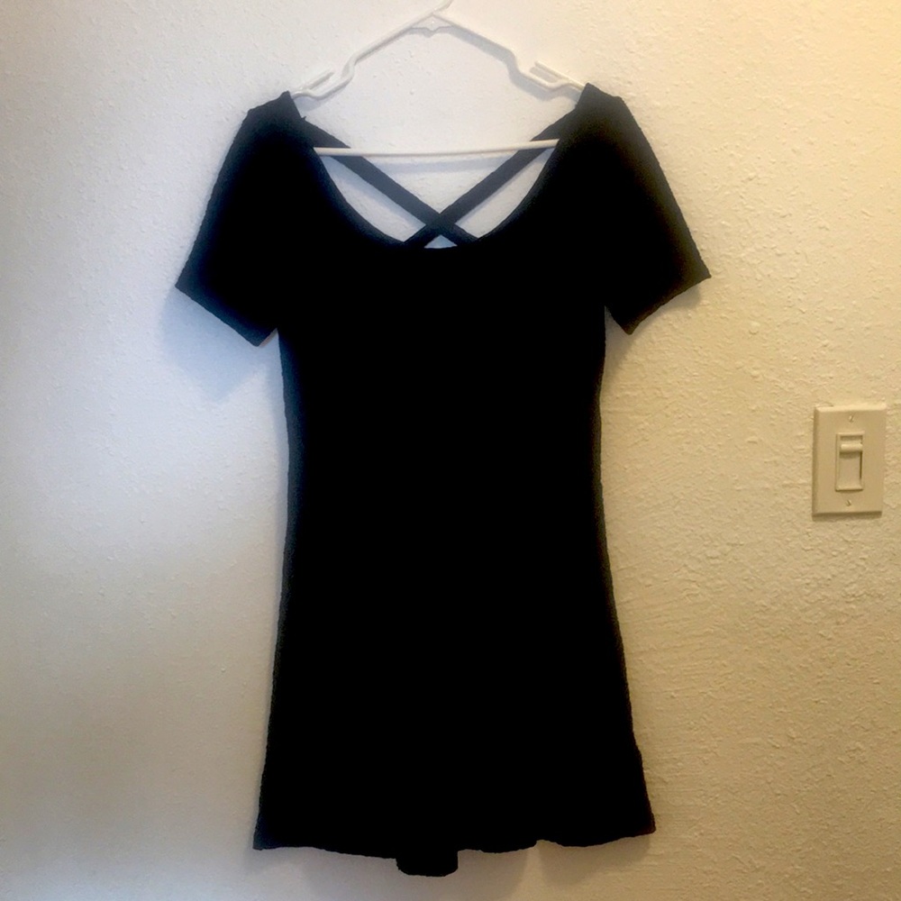 H&M Divided black skater dress with x-cross straps in back.